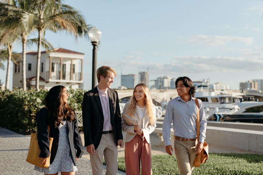 master of business administration mba students walk near the intercoastal waterway in 西<a href='http://www.22973.net'>推荐全球最大网赌正规平台欢迎您</a>.